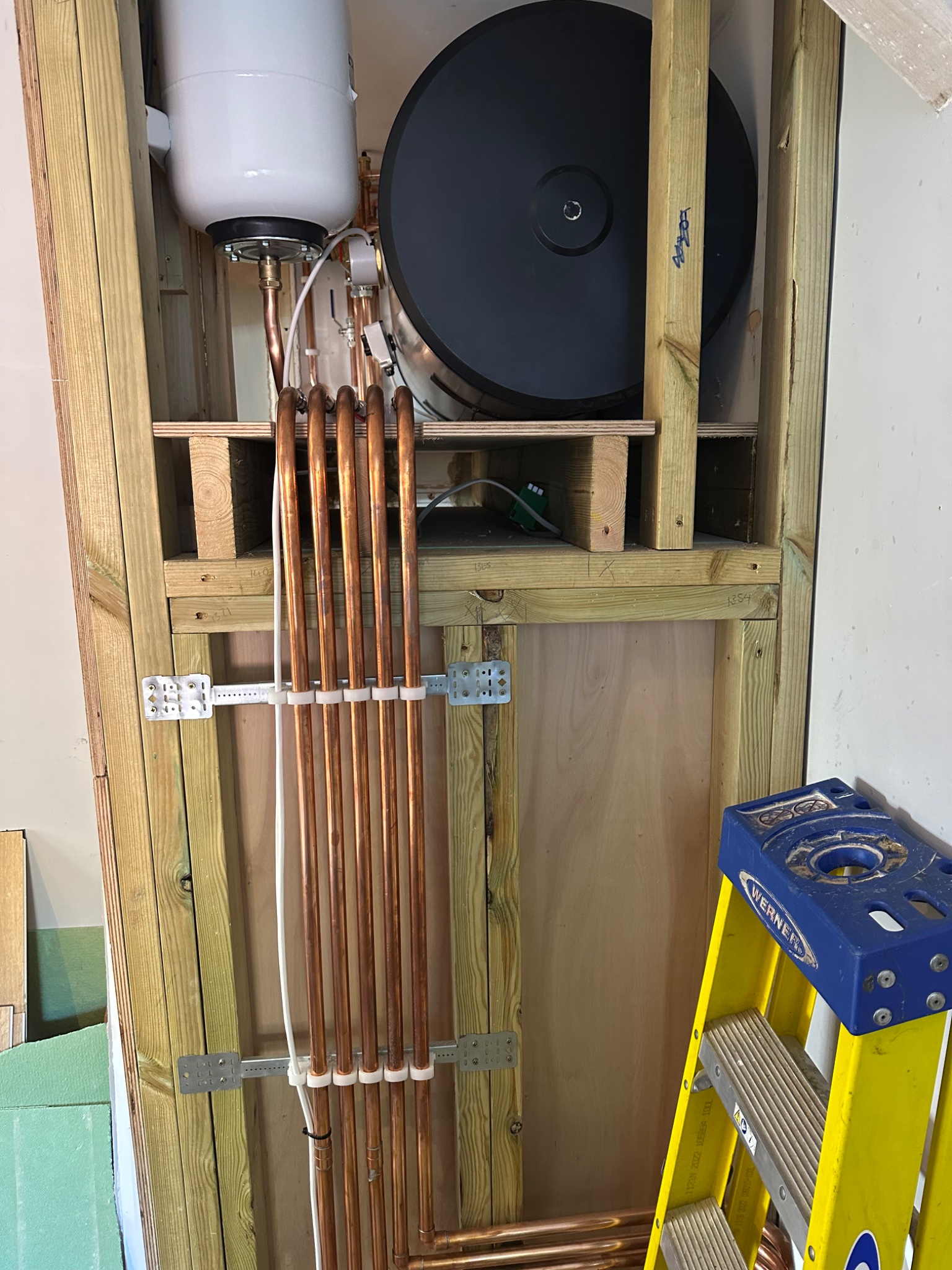 Expansion vessel and copper pipe run feeding the new unvented cylinder in Bath