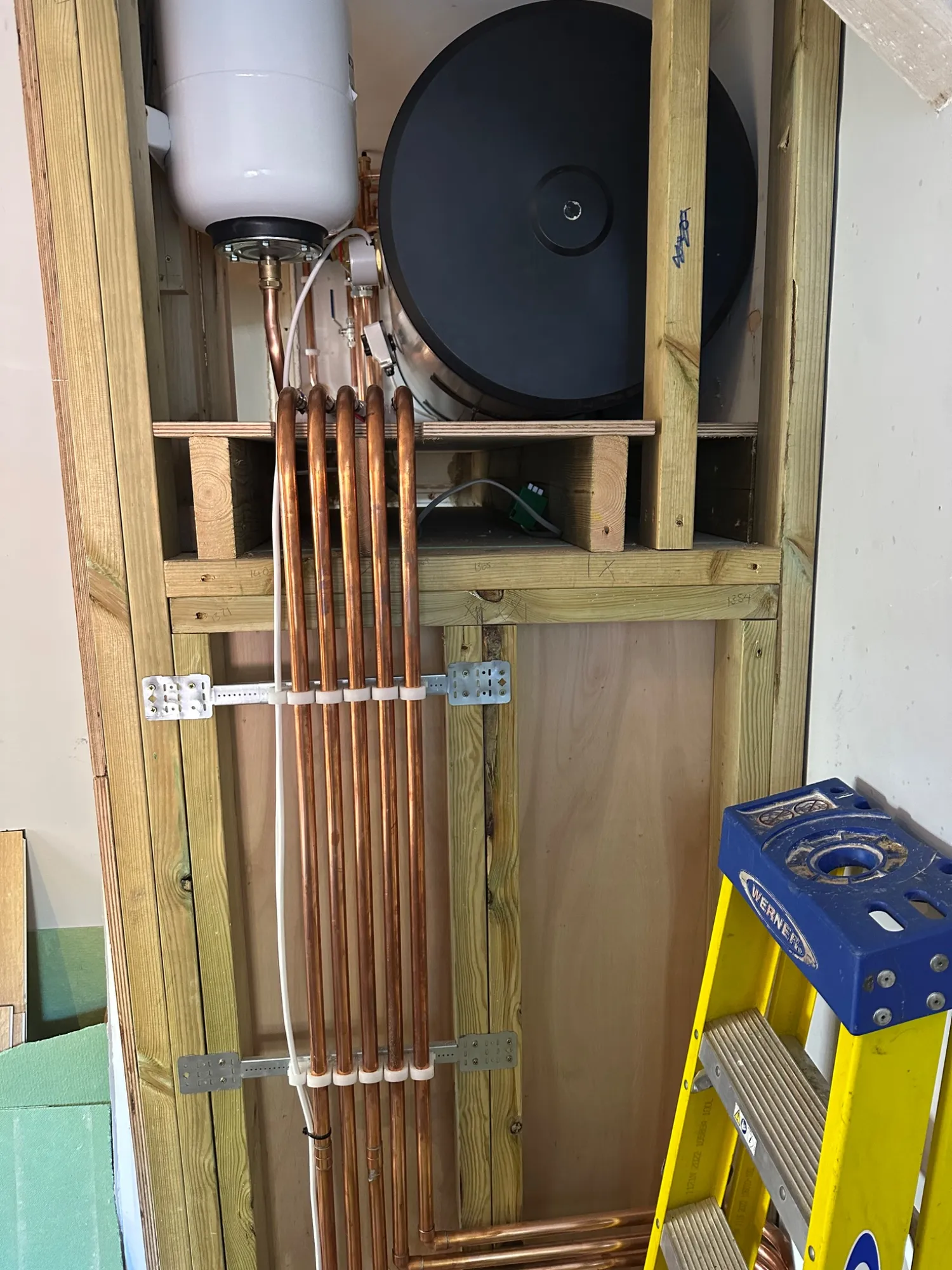 Expansion vessel and copper pipe run feeding the new unvented cylinder in Bath