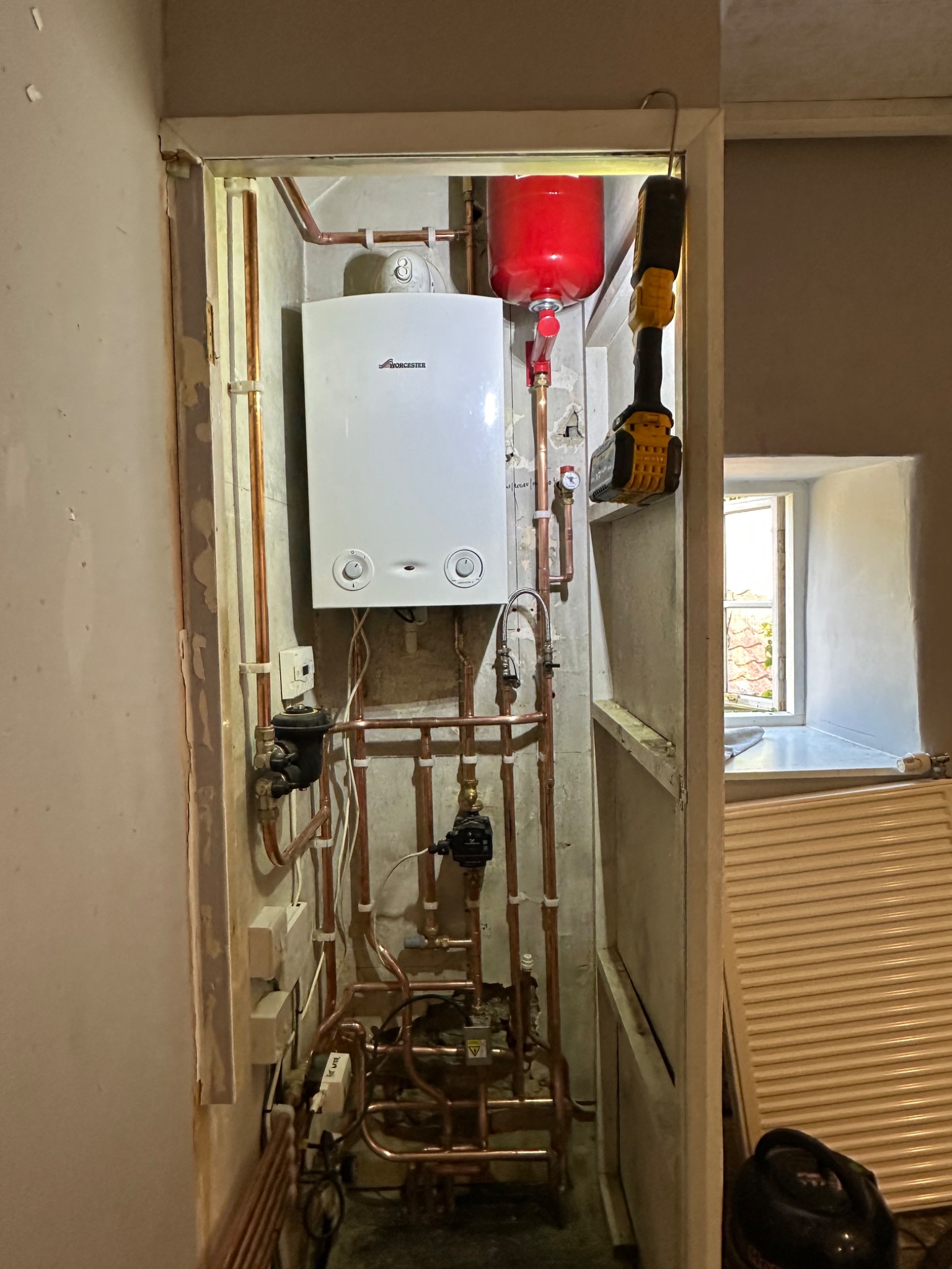 New Worcester heat only boiler and copper pipework installed in a cupboard in Bath