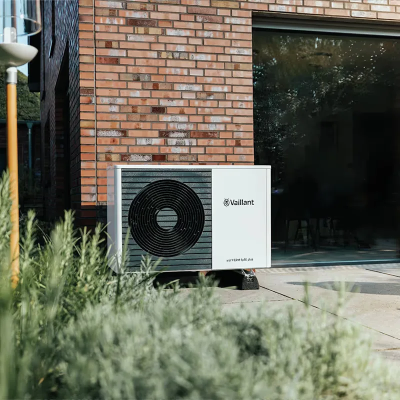 Vaillant aroTHERM air source heat pump unit sited on a patio against an exterior wall
